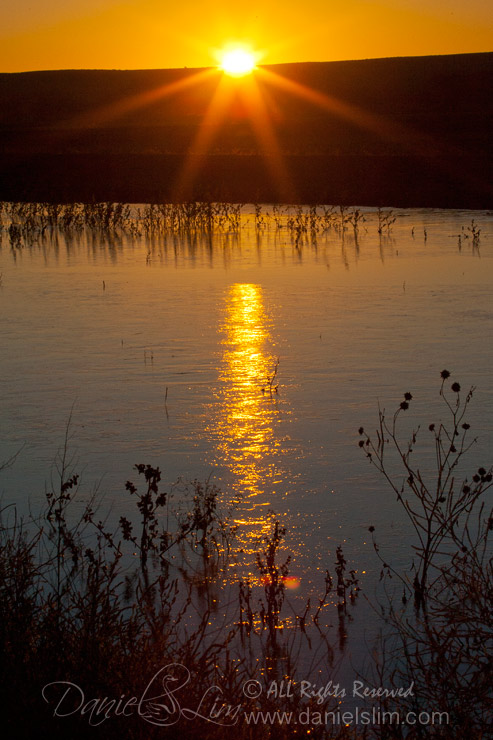 Sunrise over frozen Lake